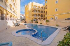 Apartment with 2 bedrooms and 1 bathroom in Algorfa, Alicante.

This charming two-bedroom, one-bathroom apartment offers a perfect move-in-ready opportunity. 

Situated on the second floor of what is arguably the best block in the Fontana Complex, it boasts stunning views from its spacious terrace over orange groves and distant mountains, ideal for relaxing and enjoying sunsets. The property has been well maintained by its original owners since new, and it features an open-plan living and dining area filled with natural light, a functional American-style kitchen with built-in appliances, and two double bedrooms with fitted wardrobes. Additional amenities include a family bathroom, a utility area with a washing machine, and an underground parking space. 

Fully furnished and equipped with air conditioning, electric radiators, and a storage room, it also grants access to a lovely communal pool and gardens, making it a perfect combination of comfort and scenic beauty close to local amenities.

Bedrooms: 2
Bathroom: 1
Build Size: 61 m2
Floor: 2nd
Orientation: West
Year of construction: 2005

Air conditioning
Fully furnished
Communal pool
Mountain views
Electric radiators
Garage
Elevator
Storage room
Terrace
Close to amenities