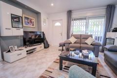 Semi detached with 3 bedrooms and 2 bathrooms in Benijofar (Benimar), Alicante.

This attractive semi-detached home offers a comfortable and versatile living space across three levels on a highly desirable corner plot. 

The property features three bedrooms and two bathrooms, including a spacious underbuild with a private entrance and an additional bedroom and bathroom, ideal for guests or extended family. Modern comforts include underfloor heating on both the ground and first floors, air conditioning, ceiling fans, and mosquito nets throughout. The main living areas are bright and spacious, with access to a private terrace overlooking the communal pool, while the top-level roof solarium provides stunning mountain views, perfect for relaxing or entertaining. The home also benefits from underground parking, off-road parking, and a large private outdoor area. 

Built in 1998, this well-maintained property is ideally suited for permanent residence, holidays, or investment, thanks to its prime location close to local amenities and its attractive outdoor spaces.

Bedrooms: 3
Bathrooms: 2
Build Size: 98 m2
Plot: 224 m2
Orientation: Southwest/Northeast
Year of construction: 1998

Air conditioning
Underfloor heating
Guttering all around
Ceiling fans
Communal pool
Corner-Plot
Garage
Off road parking
Underbuild (private entrance)
Large private roof solarium
Terrace overlooking the pool