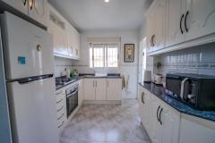 Semi detached with 3 bedrooms and 2 bathrooms in Benijofar (Benimar), Alicante.

This attractive semi-detached home offers a comfortable and versatile living space across three levels on a highly desirable corner plot. 

The property features three bedrooms and two bathrooms, including a spacious underbuild with a private entrance and an additional bedroom and bathroom, ideal for guests or extended family. Modern comforts include underfloor heating on both the ground and first floors, air conditioning, ceiling fans, and mosquito nets throughout. The main living areas are bright and spacious, with access to a private terrace overlooking the communal pool, while the top-level roof solarium provides stunning mountain views, perfect for relaxing or entertaining. The home also benefits from underground parking, off-road parking, and a large private outdoor area. 

Built in 1998, this well-maintained property is ideally suited for permanent residence, holidays, or investment, thanks to its prime location close to local amenities and its attractive outdoor spaces.

Bedrooms: 3
Bathrooms: 2
Build Size: 98 m2
Plot: 224 m2
Orientation: Southwest/Northeast
Year of construction: 1998

Air conditioning
Underfloor heating
Guttering all around
Ceiling fans
Communal pool
Corner-Plot
Garage
Off road parking
Underbuild (private entrance)
Large private roof solarium
Terrace overlooking the pool