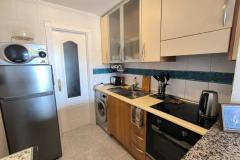 Apartment with 2 bedrooms and 1 bathroom in Algorfa, Alicante.

Discover this charming ground floor apartment nestled in the Fontana complex of Algorfa village and offers stunning panoramic views from its spacious terrace.

The property features an American-style kitchen with modern appliances, an open-plan living and dining area filled with natural light, and two double bedrooms with fitted wardrobes. Step outside onto the terrace to enjoy breathtaking vistas of orange groves and distant mountains, perfect for relaxing or entertaining. 

The apartment comes fully furnished, includes an underground parking space, and grants access to a beautiful communal pool and gardens. Although it requires some TLC, the property is attractively priced and ready for renovation.

Conveniently located within walking distance of local bars, restaurants, shops, and essential services, it offers a fantastic opportunity to create your ideal home in a picturesque setting.

Please note that completion on this property can not be taken until June 2026!

Bedrooms: 2
Bathroom: 1
Build Size: 61 m2
Orientation: West
Year of construction: 2005

Air conditioning
Fully furnished
Storage room
Utility room
Intercom
Terrace
Communal pool
Mountain views
Renovation needed
Close to amenities
Underground parking