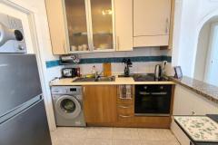 Apartment with 2 bedrooms and 1 bathroom in Algorfa, Alicante.

Discover this charming ground floor apartment nestled in the Fontana complex of Algorfa village and offers stunning panoramic views from its spacious terrace.

The property features an American-style kitchen with modern appliances, an open-plan living and dining area filled with natural light, and two double bedrooms with fitted wardrobes. Step outside onto the terrace to enjoy breathtaking vistas of orange groves and distant mountains, perfect for relaxing or entertaining. 

The apartment comes fully furnished, includes an underground parking space, and grants access to a beautiful communal pool and gardens. Although it requires some TLC, the property is attractively priced and ready for renovation.

Conveniently located within walking distance of local bars, restaurants, shops, and essential services, it offers a fantastic opportunity to create your ideal home in a picturesque setting.

Please note that completion on this property can not be taken until June 2026!

Bedrooms: 2
Bathroom: 1
Build Size: 61 m2
Orientation: West
Year of construction: 2005

Air conditioning
Fully furnished
Storage room
Utility room
Intercom
Terrace
Communal pool
Mountain views
Renovation needed
Close to amenities
Underground parking