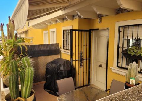 Townhouse with 2 bedrooms and 1 bathroom in Algorfa (Urb. Montemar), Alicante.

This charming townhouse offers a comfortable living space in a peaceful urbanization Montemar of Algorfa.

With two bedrooms and one bathroom, the home features a spacious basement that can serve as extra storage, a hobby room, or guest accommodation, along with a separate toilet near the entrance. Set within a secure gated complex, residents enjoy access to a communal swimming pool and various outdoor areas perfect for relaxing in the sun or shade. The property is thoughtfully designed with inviting living spaces, fitted wardrobes, and a spiral staircase leading to a solarium and balcony. Located amidst scenic citrus groves and close to golf courses, Algorfa provides a laid-back atmosphere with local amenities just a short stroll away.

Built in 2003, this east-facing home includes air conditioning, kitchen appliances, a garage, and is ideal for those seeking a low-maintenance, tranquil residence near everything you need.

Bedrooms: 2
Bathroom: 1
Build Size: 92 m2
Orientation: East
Year of construction: 2003

Air conditioning
Kitchen appliances
Fitted wardrobes
Spiral staircase
Storage room
Solarium
Balcony
Garage
Communal pool
Gated complex
Near amenities