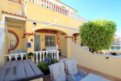 Townhouse with 3 bedrooms and 2 bathrooms in Algorfa (Lo Crispin), Alicante.

Discover this charming townhouse in the heart of Lo Crispin urbanization of Algorfa. Set within the secure Colinas De Vista Rosa community, residents enjoy access to two communal pools surrounded by lush gardens, creating a peaceful retreat.

Boasting three bedrooms and two bathrooms, this spacious home offers a perfect blend of comfort and style. The property has been upgraded by its current owners, featuring a bright and modern interior with generous indoor and outdoor living spaces. A welcoming front garden leads to a covered sun terrace, ideal for relaxing afternoons.

Inside, you'll find a large lounge-diner, a contemporary shower room, and a double bedroom on the ground floor, along with a well-appointed kitchen that opens to a glazed patio used as a games or storage room, with direct pool access.

Upstairs, two double bedrooms with built-in wardrobes and private terraces share a family bathroom with a walk-in shower. The rooftop solarium offers sunny outdoor space with lovely views over the gardens and pools, perfect for enjoying the warm Spanish climate. 

Located just a short stroll from local bars and restaurants, and close to the villages of Rojales, Benijofar and Formentera Del Segura. Built in 2005, the property is offered mostly unfurnished, with fitted wardrobes, a storage room, and a glazed patio.

Bedrooms: 3
Bathrooms: 2
Build Size: 82 m2
Orientation: East/West
Year of construction: 2005 

Mostly unfurnished
Fitted wardrobes
Storage room
Glazed patio
Solarium
Terrace
Communal pools