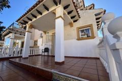 Townhouse with 2 bedrooms and 2 bathrooms in Orihuela Costa (Villas San Jose II), Alicante.

This charming townhouse offering a comfortable and stylish living space just a short distance from the vibrant heart of the area. Set on a generous 158 square meter plot, the property provides a perfect combination of privacy and outdoor enjoyment, ideal for those seeking a relaxed Mediterranean lifestyle.

Inside, the home features bright, well-proportioned rooms that create a seamless flow between indoor and outdoor living areas. The two bedrooms are spacious and inviting, complemented by two modern bathrooms designed for comfort and convenience. The living spaces are filled with natural light, enhancing the warm and welcoming atmosphere throughout the property.

Step outside to discover multiple outdoor areas, perfect for dining al fresco, entertaining guests, or simply basking in the Spanish sunshine. A notable highlight is the private solarium, an elevated space offering stunning views and ample room for sun loungers, outdoor seating, or even a summer kitchen—an ideal spot for enjoying warm evenings and sun-filled days.

Residents benefit from access to a well-maintained communal swimming pool, set within a peaceful, private street that enhances the sense of tranquility and exclusivity. The property also includes off-road parking, providing added convenience.

Located just a ten-minute walk from the lively Cabo Roig Strip, the property is close to an array of restaurants, bars, and entertainment options. The stunning beaches, local amenities, and excellent transport links are also nearby, making this an excellent choice whether as a permanent residence, holiday retreat, or investment opportunity.

Built in 2002, the property features air conditioning for comfort and offers a total build size of 85 square meters. Its northeast orientation ensures plenty of natural light, creating a bright and airy living environment in one of the most desirable areas on the Costa Blanca.

Bedrooms: 2
Bathrooms: 2
Build Size: 85 m2
Plot: 158 m2
Orientation: Northeast
Year of construction: 2002

Air conditioning
Communal pool
Private solarium
Terrace
Off road parking