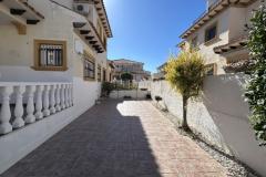 Townhouse with 2 bedrooms and 2 bathrooms in Orihuela Costa (Villas San Jose II), Alicante.

This charming townhouse offering a comfortable and stylish living space just a short distance from the vibrant heart of the area. Set on a generous 158 square meter plot, the property provides a perfect combination of privacy and outdoor enjoyment, ideal for those seeking a relaxed Mediterranean lifestyle.

Inside, the home features bright, well-proportioned rooms that create a seamless flow between indoor and outdoor living areas. The two bedrooms are spacious and inviting, complemented by two modern bathrooms designed for comfort and convenience. The living spaces are filled with natural light, enhancing the warm and welcoming atmosphere throughout the property.

Step outside to discover multiple outdoor areas, perfect for dining al fresco, entertaining guests, or simply basking in the Spanish sunshine. A notable highlight is the private solarium, an elevated space offering stunning views and ample room for sun loungers, outdoor seating, or even a summer kitchen—an ideal spot for enjoying warm evenings and sun-filled days.

Residents benefit from access to a well-maintained communal swimming pool, set within a peaceful, private street that enhances the sense of tranquility and exclusivity. The property also includes off-road parking, providing added convenience.

Located just a ten-minute walk from the lively Cabo Roig Strip, the property is close to an array of restaurants, bars, and entertainment options. The stunning beaches, local amenities, and excellent transport links are also nearby, making this an excellent choice whether as a permanent residence, holiday retreat, or investment opportunity.

Built in 2002, the property features air conditioning for comfort and offers a total build size of 85 square meters. Its northeast orientation ensures plenty of natural light, creating a bright and airy living environment in one of the most desirable areas on the Costa Blanca.

Bedrooms: 2
Bathrooms: 2
Build Size: 85 m2
Plot: 158 m2
Orientation: Northeast
Year of construction: 2002

Air conditioning
Communal pool
Private solarium
Terrace
Off road parking