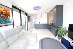 Villa with 3 bedrooms and 2 bathrooms in Los Montesinos (La Herrada), Alicante.

Discover this stunning modern villa in the sought-after La Herrada community of Los Montesinos, Alicante. Set on a private plot with off-road parking, it features a beautiful outdoor area with a private swimming pool, an inviting outdoor dining space, and a spacious sun terrace with panoramic views of the Salt Lakes.

Inside, the villa boasts a bright, open-plan living area with large sliding doors that connect seamlessly to the poolside, a designer kitchen with top appliances, and a double bedroom with en-suite on the ground floor. Upstairs, two more double bedrooms share a large family bathroom and open onto a generous sun terrace.

An external staircase leads to a magnificent solarium, ideal for relaxing and taking in the scenic surroundings. Finished to a high standard with ducted air conditioning, underfloor heating, fitted wardrobes, motorized blinds, and numerous upgrades, this property is perfect for permanent residence or luxurious holidays.

Located just a short drive from beautiful beaches, top golf courses, and well-connected to Alicante and Murcia airports, this villa offers an exceptional lifestyle on Spain’s Costa Blanca.

Bedrooms: 3
Bathrooms: 2
Build Size: 108 m2
Plot: 169 m2
Orientation: Northeast
Year of construction: 2025

Ducted air conditioning
Underfloor heating
Motorised blinds
Fitted wardrobes
Solarium
Terrace
Private pool
Off-road parking