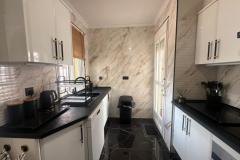 Villa with 2 bedrooms and 2 bathrooms in Vistabella, (Vistabella Golf), Alicante.

Discover this stunning single-level villa in the sought-after Vistabella community of Laguna Green I, right beside the popular Vistabella Golf course.

Situated on a generous corner plot approx. 250 m², this stylish home offers a perfect blend of modern comfort and relaxed Mediterranean living. Inside, you'll find two spacious bedrooms and two contemporary bathrooms, including a master en-suite, all finished to a high standard. The bright, open-plan living area features air conditioning and a cozy wood burner, ensuring comfort year-round. Step outside to enjoy a large private pool, expansive terrace ideal for entertaining or relaxing in the sun, and a private solarium for extra outdoor space. Additional conveniences include a storage shed, off-road parking, and a beautifully maintained garden.

Built in 2007, this property combines prime location, generous outdoor areas, and elegant upgrades, making it an ideal permanent home, holiday retreat, or rental investment on Spain’s Costa Blanca.

Bedrooms: 2
Bathrooms: 2
Build Size: 110 m2
Plot: 250 m2
Orientation: South
Year of construction: 2007

Air conditioning
Fireplace
Solarium
Terrace
Storage
Garden
Private pool
Off-road parking