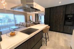 Luxurious detached villa with 3 bedrooms and 2 bathrooms in Algorfa (La Finca Golf), Alicante.

Experience the pinnacle of luxurious living with this exceptional detached villa situated within the prestigious La Finca Golf Resort in Algorfa, Alicante. This stunning residence combines high-quality finishes with an open-plan design that promotes a seamless flow throughout, creating an inviting and sophisticated atmosphere.

The property features three spacious double bedrooms and two elegantly designed bathrooms, making it an ideal sanctuary for families or individuals seeking tranquility and comfort. The master suite offers a private retreat with a dressing room and en-suite facilities, perfect for unwinding after a busy day. The modern kitchen caters to culinary enthusiasts, while the expansive lounge and dining area provide the perfect space for entertaining guests or relaxing with loved ones.

Step outside to enjoy beautifully landscaped gardens and a fabulous outdoor living area, highlighted by a private heated pool that invites year-round enjoyment. The generous 500 m² plot ensures ample space for outdoor activities and relaxation. Additional features include air conditioning, double-glazed windows with electric shutters, off-road parking, a laundry area, and a terrace for enjoying the pleasant northeast orientation.

Built in 2023, this fully furnished villa is equipped with energy-efficient features and is conveniently located close to a wide array of amenities, including award-winning golf courses, vibrant bars, and exceptional restaurants. Whether seeking a luxurious permanent residence or a sophisticated holiday retreat, this property offers an unparalleled lifestyle in the beautiful Alicante region.

Bedrooms: 3
Bathrooms: 2
Build Size: 133 m2
Plot: 500 m2
Orientation: Northeast
Year of construction: 2023

Air conditioning
Fully furnished
Private heated pool
Off road parking
Garden
Laundry
Terrace
Close to amenities
Double glazed windows
Electric shutters