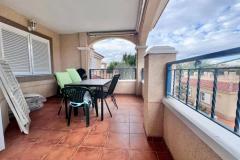 Top floor apartment with 2 bedrooms and 1 bathroom in Pilar de la Horadada (Mil Palmeras), Alicante.

This stunning apartment is situated just a few meters from the beach, it is surrounded by beautifully maintained green and landscaped areas, offering a peaceful and inviting environment.

The property boasts a spacious terrace on the main level, perfect for enjoying the Mediterranean climate with direct views of the communal pool. Inside, it features two bedrooms and a bathroom, along with a bright and airy living-dining room that opens directly onto the terrace, creating a sense of space and comfort. The fully equipped French-style kitchen is complemented by a practical separate laundry area.

Upstairs, there is a spectacular private solarium of 58 m2, ideal for sunbathing, relaxing, or setting up a chill-out zone, with views overlooking the pool area. The urbanization provides a tranquil setting with expansive landscaped communal gardens, making it suitable for both holidays and permanent residence.

Additional features include air conditioning, furniture, a garage space included in the price, a storage room, and the property is sold furnished. Constructed in 2003, the property has a total built area of 120 m2 and faces northeast.

This is a unique opportunity to enjoy coastal living in one of the most desirable areas of Mil Palmeras, with all the amenities and comforts to make everyday life enjoyable.

Bedrooms: 2
Bathroom: 1
Build Size: 120 m2
Orientation: Northeast
Year of construction: 2003

Air conditioning
Community pool
Fully furnished
Solarium
Garage (included in price)
Terrace
Wardrobes cupboard
Washing room
Storeroom