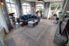 Villa with 5 bedrooms and 3 bathrooms in Torrevieja (La Siesta), Alicante.

This stunning villa located in the desirable La Siesta neighborhood of Torrevieja, Alicante, offers a rare opportunity to own a beautifully renovated, turnkey property with exceptional versatility and investment potential. Situated on an impressive 800 m² corner plot, the residence seamlessly combines contemporary comfort with Mediterranean charm, making it perfect for families, holidaymakers, or investors seeking a high-yield rental property.

The villa comprises two fully independent homes, providing flexible living arrangements or rental options. The first residence features two spacious double bedrooms, a modern bathroom finished with high-quality fittings, a practical laundry room, and a bright, inviting sunroom ideal for relaxing mornings or casual gatherings. The second residence boasts three generously sized bedrooms, two stylish bathrooms, and an open-plan living area that promotes a seamless flow, perfect for modern family life or entertaining guests. Both units are equipped with ducted air conditioning and a comprehensive security system with cameras, ensuring comfort and peace of mind throughout the year.

Externally, the property is a private outdoor oasis designed for Mediterranean living. Enclosed by 2-meter privacy walls, it offers a tranquil environment to enjoy the Spanish lifestyle. At its center is a resort-style swimming pool measuring 10 by 5 meters, ideal for leisure and family fun. The outdoor entertainment zone is fully equipped with a professional outdoor bar and kitchen, electric blinds for shade control, and a large 60-inch television, creating an ideal space for social gatherings. Additional features include a Weber BBQ area and a pellet boiler, ensuring comfort during cooler months.

Practical amenities include a large covered carport, electric gates and doors, and multiple side entrances for effortless access. The location in La Siesta places residents close to lively bars and restaurants just 50 meters away, while the stunning beaches of Torrevieja are only 4 km from the property. Daily essentials, shops, and transport links are conveniently nearby, making this an ideal base for both permanent living and holiday rentals.

A significant advantage of this property is its existing tourist rental license, allowing for immediate operation as a legal holiday rental. Currently generating around €4,500 per week, the villa demonstrates its strong earning potential in one of Costa Blanca’s most competitive markets. The combination of high-quality renovations, dual-living layout, and prime location makes this villa an outstanding investment opportunity with long-term financial security.

Bedrooms: 5
Bathrooms: 3
Build size: 186 m2
Plot size: 800 m2

Air conditioning (ducted)
Electric gates and doors
Two independent homes
Corner plot
Laundry room
BBQ area
Electric blinds
Fully renovated
Turn key property
Private pool
Tourist licence
Guest Apartment