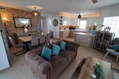 Villa with 5 bedrooms and 3 bathrooms in Torrevieja (La Siesta), Alicante.

This stunning villa located in the desirable La Siesta neighborhood of Torrevieja, Alicante, offers a rare opportunity to own a beautifully renovated, turnkey property with exceptional versatility and investment potential. Situated on an impressive 800 m² corner plot, the residence seamlessly combines contemporary comfort with Mediterranean charm, making it perfect for families, holidaymakers, or investors seeking a high-yield rental property.

The villa comprises two fully independent homes, providing flexible living arrangements or rental options. The first residence features two spacious double bedrooms, a modern bathroom finished with high-quality fittings, a practical laundry room, and a bright, inviting sunroom ideal for relaxing mornings or casual gatherings. The second residence boasts three generously sized bedrooms, two stylish bathrooms, and an open-plan living area that promotes a seamless flow, perfect for modern family life or entertaining guests. Both units are equipped with ducted air conditioning and a comprehensive security system with cameras, ensuring comfort and peace of mind throughout the year.

Externally, the property is a private outdoor oasis designed for Mediterranean living. Enclosed by 2-meter privacy walls, it offers a tranquil environment to enjoy the Spanish lifestyle. At its center is a resort-style swimming pool measuring 10 by 5 meters, ideal for leisure and family fun. The outdoor entertainment zone is fully equipped with a professional outdoor bar and kitchen, electric blinds for shade control, and a large 60-inch television, creating an ideal space for social gatherings. Additional features include a Weber BBQ area and a pellet boiler, ensuring comfort during cooler months.

Practical amenities include a large covered carport, electric gates and doors, and multiple side entrances for effortless access. The location in La Siesta places residents close to lively bars and restaurants just 50 meters away, while the stunning beaches of Torrevieja are only 4 km from the property. Daily essentials, shops, and transport links are conveniently nearby, making this an ideal base for both permanent living and holiday rentals.

A significant advantage of this property is its existing tourist rental license, allowing for immediate operation as a legal holiday rental. Currently generating around €4,500 per week, the villa demonstrates its strong earning potential in one of Costa Blanca’s most competitive markets. The combination of high-quality renovations, dual-living layout, and prime location makes this villa an outstanding investment opportunity with long-term financial security.

Bedrooms: 5
Bathrooms: 3
Build size: 186 m2
Plot size: 800 m2

Air conditioning (ducted)
Electric gates and doors
Two independent homes
Corner plot
Laundry room
BBQ area
Electric blinds
Fully renovated
Turn key property
Private pool
Tourist licence
Guest Apartment