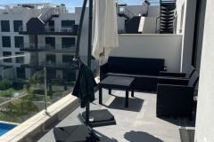 Penthouse with 2 bedrooms and 2 bathrooms in Orihuela Costa (Villamartin), Alicante.

Discover this exceptional penthouse offering a perfect blend of modern comfort and relaxed Mediterranean living. This bright and spacious apartment features two bedrooms and two bathrooms, encompassing a total build size of 97 square meters on the third floor, with a desirable south-facing orientation that ensures plenty of natural sunlight throughout the day. Constructed in 2020, the property combines contemporary design with practical amenities, making it an ideal home or holiday retreat.

Step inside to find an open-plan American kitchen fully equipped with all necessary appliances, seamlessly connected to a welcoming living space. The apartment’s large windows and terrace provide stunning views of the lush communal gardens and inviting swimming pool, creating a tranquil backdrop for everyday life. The spacious terrace and expansive solarium, furnished with an aluminum lounge set, sun loungers, and a canvas pergola, offer the perfect outdoor oasis for sunbathing, entertaining, or simply unwinding under the warm Costa Blanca sun.

The interior is climate-controlled with air conditioning, ensuring comfort year-round. The property comes fully furnished, ready for immediate move-in, and features modern conveniences such as white goods, an intercom system, reinforced security door, and elevator access. For added convenience, a private garage and basement provide ample parking and storage options.

Located within close proximity to Villamartin Plaza and renowned golf courses, this residence offers a luxurious, relaxed lifestyle in a sought-after area. Whether you’re seeking a permanent home or a holiday escape, this property truly has it all. All that’s missing is your good mood—come and enjoy the sunny Costa Blanca in style.

Bedrooms: 2
Bathrooms: 2
Build Size: 97 m2
Floor: 3rd
Orientation: South
Year of construction: 2020

Air conditioning
Fully furnished
Elevator
Balcony
White goods
Garage
Communal pool
Intercom
Reinforced door
Solarium
Basement
Terrace