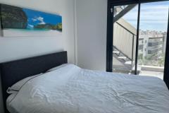 Penthouse with 2 bedrooms and 2 bathrooms in Orihuela Costa (Villamartin), Alicante.

Discover this exceptional penthouse offering a perfect blend of modern comfort and relaxed Mediterranean living. This bright and spacious apartment features two bedrooms and two bathrooms, encompassing a total build size of 97 square meters on the third floor, with a desirable south-facing orientation that ensures plenty of natural sunlight throughout the day. Constructed in 2020, the property combines contemporary design with practical amenities, making it an ideal home or holiday retreat.

Step inside to find an open-plan American kitchen fully equipped with all necessary appliances, seamlessly connected to a welcoming living space. The apartment’s large windows and terrace provide stunning views of the lush communal gardens and inviting swimming pool, creating a tranquil backdrop for everyday life. The spacious terrace and expansive solarium, furnished with an aluminum lounge set, sun loungers, and a canvas pergola, offer the perfect outdoor oasis for sunbathing, entertaining, or simply unwinding under the warm Costa Blanca sun.

The interior is climate-controlled with air conditioning, ensuring comfort year-round. The property comes fully furnished, ready for immediate move-in, and features modern conveniences such as white goods, an intercom system, reinforced security door, and elevator access. For added convenience, a private garage and basement provide ample parking and storage options.

Located within close proximity to Villamartin Plaza and renowned golf courses, this residence offers a luxurious, relaxed lifestyle in a sought-after area. Whether you’re seeking a permanent home or a holiday escape, this property truly has it all. All that’s missing is your good mood—come and enjoy the sunny Costa Blanca in style.

Bedrooms: 2
Bathrooms: 2
Build Size: 97 m2
Floor: 3rd
Orientation: South
Year of construction: 2020

Air conditioning
Fully furnished
Elevator
Balcony
White goods
Garage
Communal pool
Intercom
Reinforced door
Solarium
Basement
Terrace