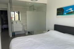 Penthouse with 2 bedrooms and 2 bathrooms in Orihuela Costa (Villamartin), Alicante.

Discover this exceptional penthouse offering a perfect blend of modern comfort and relaxed Mediterranean living. This bright and spacious apartment features two bedrooms and two bathrooms, encompassing a total build size of 97 square meters on the third floor, with a desirable south-facing orientation that ensures plenty of natural sunlight throughout the day. Constructed in 2020, the property combines contemporary design with practical amenities, making it an ideal home or holiday retreat.

Step inside to find an open-plan American kitchen fully equipped with all necessary appliances, seamlessly connected to a welcoming living space. The apartment’s large windows and terrace provide stunning views of the lush communal gardens and inviting swimming pool, creating a tranquil backdrop for everyday life. The spacious terrace and expansive solarium, furnished with an aluminum lounge set, sun loungers, and a canvas pergola, offer the perfect outdoor oasis for sunbathing, entertaining, or simply unwinding under the warm Costa Blanca sun.

The interior is climate-controlled with air conditioning, ensuring comfort year-round. The property comes fully furnished, ready for immediate move-in, and features modern conveniences such as white goods, an intercom system, reinforced security door, and elevator access. For added convenience, a private garage and basement provide ample parking and storage options.

Located within close proximity to Villamartin Plaza and renowned golf courses, this residence offers a luxurious, relaxed lifestyle in a sought-after area. Whether you’re seeking a permanent home or a holiday escape, this property truly has it all. All that’s missing is your good mood—come and enjoy the sunny Costa Blanca in style.

Bedrooms: 2
Bathrooms: 2
Build Size: 97 m2
Floor: 3rd
Orientation: South
Year of construction: 2020

Air conditioning
Fully furnished
Elevator
Balcony
White goods
Garage
Communal pool
Intercom
Reinforced door
Solarium
Basement
Terrace