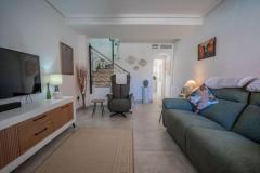 South facing townhouse with 2 bedrooms and 2 bathroom in Ciudad Quesada (Doña Pepa), Alicante.

Discover this charming south-facing townhouse in the heart of Ciudad Quesada. This well-maintained property offers 82m² of bright, thoughtfully designed living space, perfect for comfortable year-round living, a holiday retreat, or a lucrative rental investment on the Costa Blanca. The home features two spacious bedrooms, including a main bedroom with air conditioning, and two modern bathrooms, complemented by a guest WC. The large, fully fitted kitchen boasts modern finishes and ample storage, ideal for everyday living. The welcoming lounge is equipped with climate control for all seasons, creating a cozy ambiance.

Enjoy sunny outdoor living with front and rear terraces, both tiled for low maintenance. The rear terrace benefits from all-day sunshine—perfect for relaxing, dining, or entertaining—while the front terrace offers a peaceful spot for morning coffee. The property is in excellent condition, with recent upgrades including a new boiler, ceiling fans, and climate control features.

Set within a secure gated community, residents have access to two communal swimming pools and beautifully landscaped gardens. The peaceful, established neighborhood is within walking distance to supermarkets, bars, restaurants, medical facilities, and La Marquesa Golf. The stunning beaches of Guardamar del Segura are just a short drive away, with Alicante Airport approximately 40 minutes from the property.

This turn-key townhouse combines modern comfort, convenient location, and outdoor leisure, making it an ideal choice for those seeking a relaxed Mediterranean lifestyle in one of Ciudad Quesada’s most sought-after areas.

Community fees: 356€/Yearly

Bedrooms: 2
Bathroom: 2
Build Size: 82 m2
Orientation: South
Year of construction: 2006

Air conditioning
Communal pool
Turn key property
Large modern kitchen
Front and rear terrace
Walking distance to all amenities
Close to La Marquesa Golf
Porch