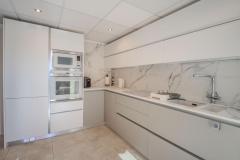 South facing townhouse with 2 bedrooms and 2 bathroom in Ciudad Quesada (Doña Pepa), Alicante.

Discover this charming south-facing townhouse in the heart of Ciudad Quesada. This well-maintained property offers 82m² of bright, thoughtfully designed living space, perfect for comfortable year-round living, a holiday retreat, or a lucrative rental investment on the Costa Blanca. The home features two spacious bedrooms, including a main bedroom with air conditioning, and two modern bathrooms, complemented by a guest WC. The large, fully fitted kitchen boasts modern finishes and ample storage, ideal for everyday living. The welcoming lounge is equipped with climate control for all seasons, creating a cozy ambiance.

Enjoy sunny outdoor living with front and rear terraces, both tiled for low maintenance. The rear terrace benefits from all-day sunshine—perfect for relaxing, dining, or entertaining—while the front terrace offers a peaceful spot for morning coffee. The property is in excellent condition, with recent upgrades including a new boiler, ceiling fans, and climate control features.

Set within a secure gated community, residents have access to two communal swimming pools and beautifully landscaped gardens. The peaceful, established neighborhood is within walking distance to supermarkets, bars, restaurants, medical facilities, and La Marquesa Golf. The stunning beaches of Guardamar del Segura are just a short drive away, with Alicante Airport approximately 40 minutes from the property.

This turn-key townhouse combines modern comfort, convenient location, and outdoor leisure, making it an ideal choice for those seeking a relaxed Mediterranean lifestyle in one of Ciudad Quesada’s most sought-after areas.

Community fees: 356€/Yearly

Bedrooms: 2
Bathroom: 2
Build Size: 82 m2
Orientation: South
Year of construction: 2006

Air conditioning
Communal pool
Turn key property
Large modern kitchen
Front and rear terrace
Walking distance to all amenities
Close to La Marquesa Golf
Porch