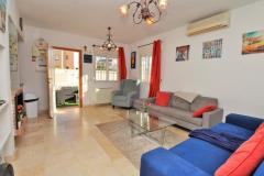 Semi detached with 3 bedrooms and 2 bathrooms in Orihuela Costa (Jumilla, Playa Flamenca), Alicante.

Discover this charming semi-detached home in Orihuela Costa, situated in the sought-after community of Jumilla, Playa Flamenca, Alicante. Featuring three spacious bedrooms and two modern bathrooms, this property offers a perfect blend of comfort and outdoor living. Set on a rare, large corner plot within a secure gated community, it boasts extensive wraparound gardens ideal for entertaining, sunbathing, or enjoying the Mediterranean climate. The property includes off-road parking, ensuring convenience and privacy.

The interior showcases a bright lounge with a cozy fireplace, a well-equipped kitchen, and two double bedrooms with fitted wardrobes on the ground floor. Upstairs, you’ll find a twin bedroom, a second bathroom, and access to a generous private balcony, perfect for relaxing and soaking up the sunshine. The home is fully furnished with air conditioning, white goods, ceiling fans, and stylish fixtures, ready for immediate move-in.

Located just a short walk from vibrant bars, restaurants, and amenities of La Florida and Playa Flamenca, this residence provides easy access to stunning beaches, Zenia Boulevard shopping center, golf courses including Villamartin, Campoamor, and Las Ramblas, and excellent transport links. The community features a beautiful communal pool and well-maintained gardens, creating a peaceful and secure environment. With properties of this size and location rarely available, early viewing is highly recommended to secure this exceptional opportunity.

SUMA/IBI: 225€/Yearly
Community fees: 65€/Montly

Bedrooms: 3
Bathrooms: 2
Build Size: 90 m2
Orientation: Northeast
Year of construction: 2001

Air conditioning
Furnished
Private garden
Store room
White goods
Terrace
Fireplace
Communal garden
Ceiling fans
Gated community
Fitted wardrobes
Balcony
Walking to zenia boulevard