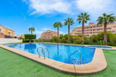 Townhouse with 3 bedrooms and 2 bathrooms in Orihuela Costa (Oasis Golf, Los Dolses), Alicante.

Discover this charming townhouse, offering a spacious and practical layout, this property features three bedrooms and two bathrooms, perfect for comfortable family living. 

The separate kitchen adds convenience, while the generous 66.90 m² enclosed garage provides ample space for three cars and versatile possibilities such as a workshop, hobby room, or additional apartment conversion. Situated on a 175 m² corner plot, the property boasts a 125 m² paved garden ideal for enjoying the Mediterranean outdoors, with potential space for a private pool. The house, built in 2007 and in excellent condition, includes modern amenities like air conditioning, a solarium, basement, and is sold furnished. Residents also benefit from a communal swimming pool, enhancing the relaxed lifestyle in this vibrant community. 

This turnkey home offers a perfect blend of privacy, space, and outdoor living in one of the most desirable locations in Alicante.

Bedrooms: 3
Bathrooms: 2
Build Size: 96 m2
Plot: 175 m2
Orientation: Southeast
Year of construction: 2007

Air Conditioning
Turn key property
Space for private pool
Solarium
Basement
Communal pool
Furnished
Garage
Storage Room