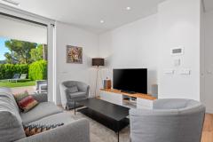 Exclusive luxury ground floor apartment with 2 bedrooms and 2 bathrooms in Las Colinas Golf Resort, Alicante.

Experience luxury living with this exclusive ground floor apartment, located in the prestigious Níspero Community within the renowned Las Colinas Golf & Country Club, this stylish residence offers the perfect blend of comfort, elegance, and natural beauty on the Costa Blanca. 

Featuring two spacious bedrooms and two modern bathrooms finished with high-quality materials, this home provides a timeless and sophisticated ambiance. The open-plan kitchen is fully equipped, including a built-in wine cooler, ideal for enjoying leisurely Mediterranean evenings. Offered fully furnished and move-in ready, this property includes a private parking space, a spacious storage room suitable for golf equipment or bicycles, and access to a community fitness room. Residents can enjoy the communal pool, terrace, and the tranquility of one of Spain’s most secure and picturesque resorts. 

Built in 2021, this turnkey apartment combines contemporary design with functional features such as air conditioning and elevator access, making it an exceptional opportunity for those seeking a luxurious lifestyle on the Costa Blanca.
 
Bedrooms: 2
Bathrooms: 2
Build Size: 93 m2
Floor: Ground floor
Orientation: Southwest
Year of construction: 2021

Turnkey property
Fully furnished
Air conditioning
Elevator
Communal pool
Terrace
Storage room
Private parking space