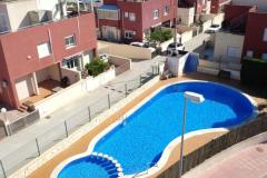 Townhouse with 3 bedrooms and 2 bathrooms in Orihuela Costa (Villamartin), Alicante.

Discover this charming 3-bedroom, 2-bathroom townhouse, this property combines comfort, outdoor living, and stunning sea views, making it an ideal permanent residence, holiday retreat, or investment opportunity.

The home features a bright, welcoming living area with dining space, a fully equipped kitchen, and a modern bathroom on the ground floor. Step outside to a spacious private terrace, perfect for outdoor dining and enjoying the Mediterranean climate. Upstairs, you'll find three well-sized bedrooms, including a private balcony, and an additional bathroom. The highlight is the impressive roof terrace or solarium, offering spectacular views of the sea—ideal for relaxing, sunbathing, or entertaining guests.

Partly renovated with a fresh, modern touch, the property is sold fully furnished, ready for immediate move-in or rental. Residents enjoy access to a beautiful communal pool area, perfect for cooling off during warm summer days. The townhouse is close to golf courses, restaurants, shops, and just a short drive from Orihuela Costa’s stunning beaches, providing excellent value in a prime location.

Built in 2005, this southwest-facing property includes amenities such as air conditioning, a garden, laundry area, storage room, reinforced door, porch, terrace, and more. An excellent opportunity to own a piece of the Costa Blanca in Villamartín—viewings are highly recommended.

Bedrooms: 3
Bathrooms: 2
Build Size: 87 m2
Orientation: Southwest
Year of construction: 2005

Air conditioning
Furnished
Balcony
Home appliances
Garden
Laundry
Communal pool
Porch
Reinforced door
Solarium
Terrace
Storage room